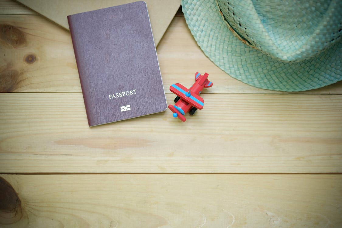 A brown passport, ready for international travel, symbolizing the importance of keeping travel documents up to date.